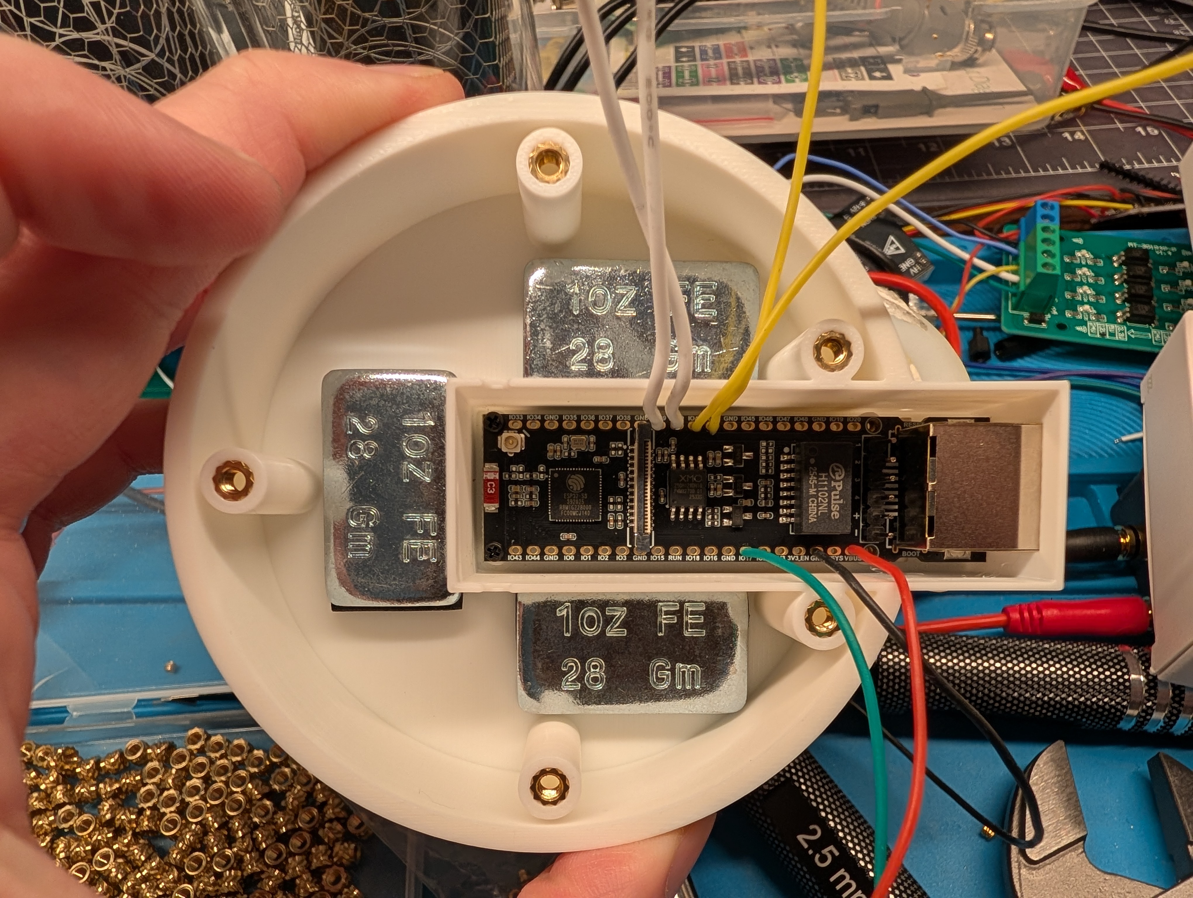 ESP32 board seated in the side pod with wires soldered