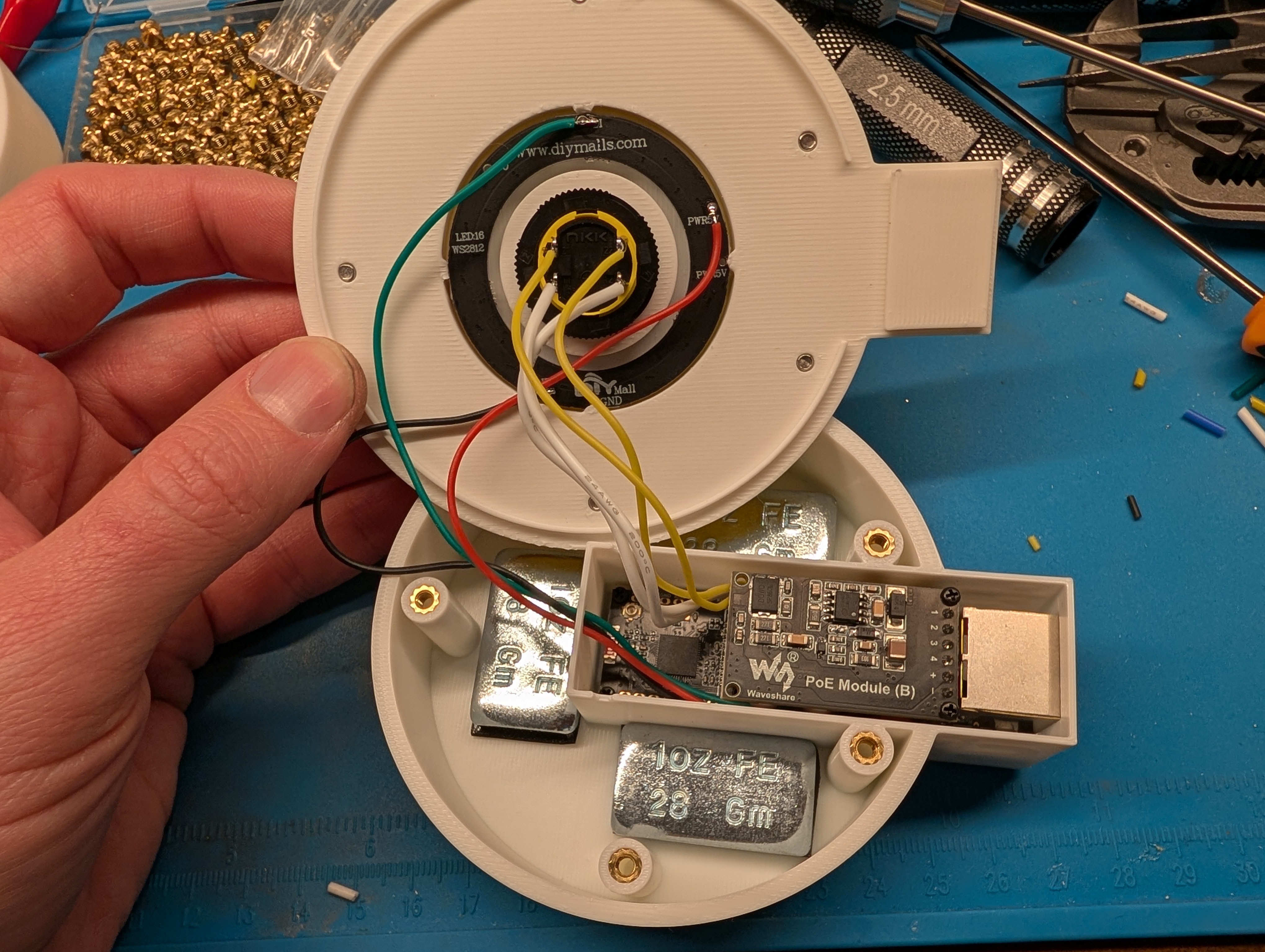 Lid and base joined by the wires